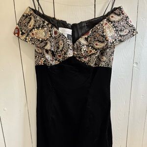 Vintage off the shoulder dress with gold detailing. The bottom is velvet!